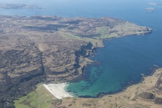 General oblique aerial view of Calgary Bay on the Isle of Mull, looking SW.