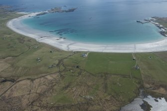 General oblique aerial view of Kirkapol and Gott Bay on the Isle of Tiree, looking SSE.