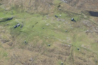 Oblique aerial view of Bheinn Gott radar station on the Isle of Tiree, looking S.