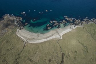 General oblique aerial view of Cliad Bay on the Isle of Coll, looking NW.