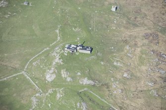 Oblique aerial view of the radar station on Beinn Ghott on the Isle of Tiree, looking NW.