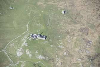 Oblique aerial view of the radar station on Beinn Ghott on the Isle of Tiree, looking NW.