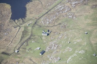 Oblique aerial view of the radar station on Beinn Ghott on the Isle of Tiree, looking W.