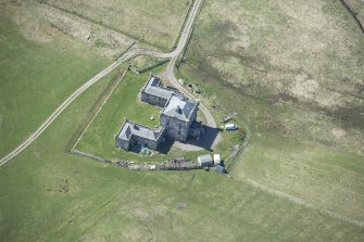 Oblique aerial view of Breachacha House on the Isle of Coll, looking SW.