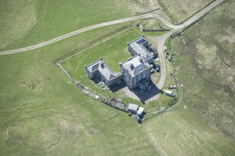 Oblique aerial view of Breachacha House on the Isle of Coll, looking S.