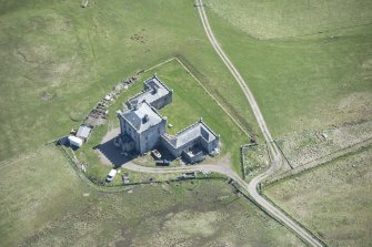 Oblique aerial view of Breachacha House on the Isle of Coll, looking ESE.