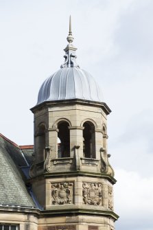 Detail of upper tower, west wing, south elevation.