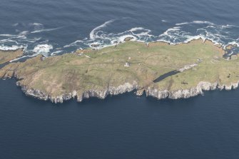 Oblique aerial view of the New Lighthouse, Keepers Cottage on the Isle of May, looking E.
