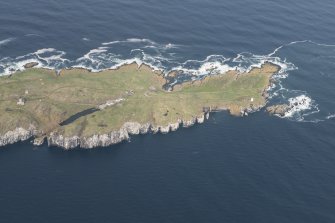 Oblique aerial view of the South Fog Horn, New Lighthouse, Keepers Cottage on the Isle of May, looking E.