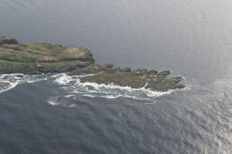 Oblique aerial view of Low Lighthouse and cottages and the New Lighthouse on the Isle of May, looking N.
