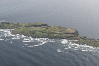 Oblique aerial view of the Low and New Lighthouses, Lighthouse and Keepers Cottage, and the South Horn on the Isle of May, looking W.