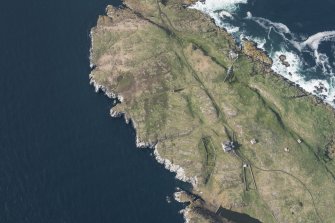 Oblique aerial view of the Low Lighthouse and Cottages and the New Lighthouse on the Isle of May, looking N.