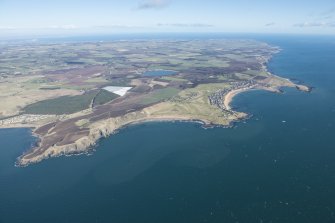 General oblique aerial view of the East Neuk of Fife including Elie and Elie Golf Course, looking NE.