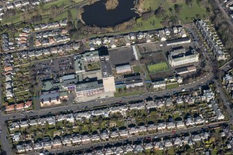 Oblique aerial view of Portobello High School and St John's RC Primary School, looking N.