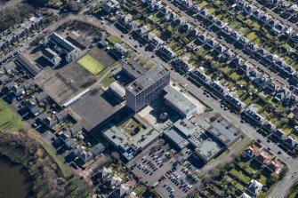 Oblique aerial view of Portobello High School and St John's RC Primary School, looking ESE.