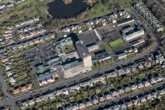 Oblique aerial view of Portobello High School and St John's RC Primary School, looking N.