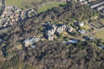 Oblique aerial view of New Craig House, East Craig, Old Craig House and Queen's Craig House, looking NNE.