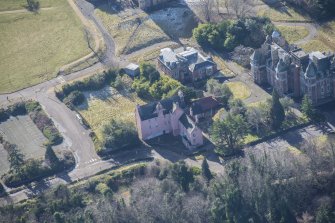 Oblique aerial view of Old Craig House and East Craig House, looking SSW.