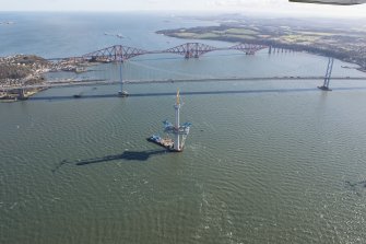 Oblique aerial view of the Queensferry Crossing, Forth Bridge and Forth Road Bridge, looking E.