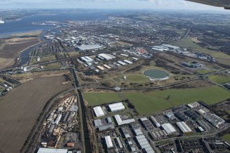 General oblique aerial view of the Grangemouth area centred on The Helix, the town of Grangemouth and Grangemouth oil refinery, looking NE.