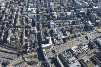 Oblique aerial view of the west end of Glasgow City Centre, Sauchiehall Street, Garnethill and Charing Cross, looking ESE.