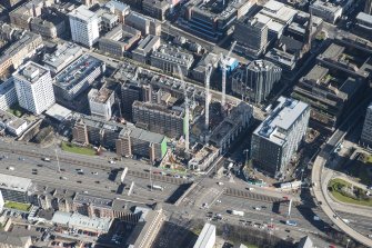 Oblique aerial view of the west end of Glasgow City Centre, Charing cross, Britoil Headquarters and Elmbank Street, looking E.