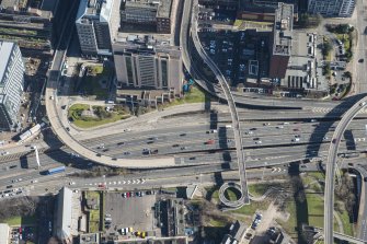 Oblique aerial view of Charing Cross, looking E.