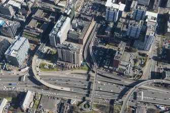 Oblique aerial view of Charing Cross, looking ENE.