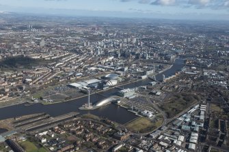General oblique aerial view of Glasgow centred on the River Clyde and Science Park, looking NE.