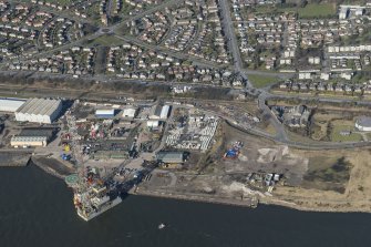 Oblique aerial view of Caledon East Wharf and Stannergate Oil Mill, looking NNW.