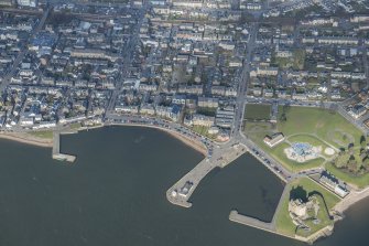 Oblique aerial view of Broughty Ferry, Broughty Ferry Harbour, Beach Crescent and Broughty Castle, looking NE.