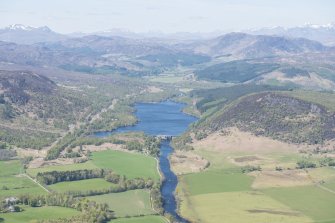 General oblique aerial view centred on Loch Achonachie and Tor Achilty power station, looking WNW.