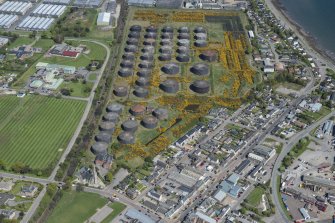 Oblique aerial view of Invergordon oil storage tanks, looking NE.