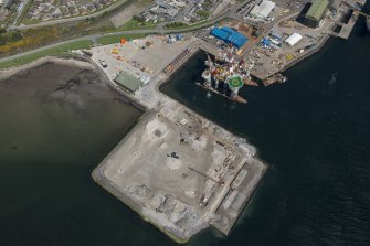 Oblique aerial view of Invergordon oil rig service base, looking NW.