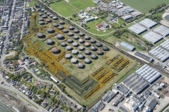 Oblique aerial view of Invergordon oil storage tanks, looking WNW.