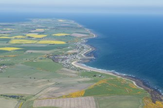 General oblique aerial view centred on Balintore with Tarbat Ness beyond, looking NE.