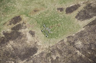 Oblique aerial view of the Balnacrae chambered cairn, looking ENE.