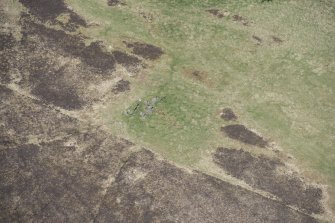 Oblique aerial view of the Balnacrae chambered cairn, looking N.