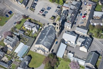 Oblique aerial view of Tain Free Church, looking N.
