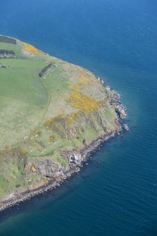 General oblique aerial view centred on North Sutor Coastal Battery, looking ENE.