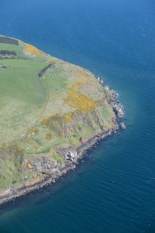 General oblique aerial view centred on North Sutor Coastal Battery, looking ENE.