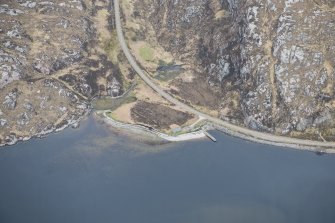 Oblique aerial view of the pier at Laxford Bay, looking NE.