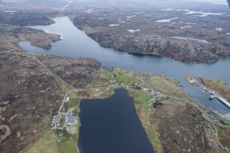 General oblique aerial view of Kinlochbervie with Loch Inchard beyond, looking S.