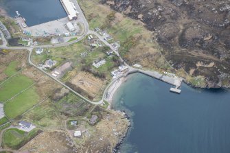 Oblique aerial view of Kinlochbervie North Pier and harbour, looking S.