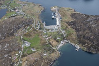 Oblique aerial view of Kinlochbervie North Pier and harbour, looking SSE.