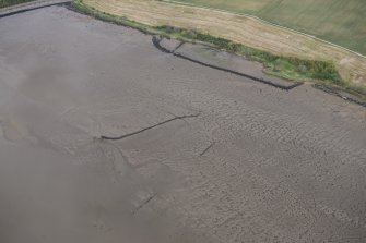 Oblique aerial view of fish traps near Balcladaich Wood on the Cromarty Firth, looking ESE.