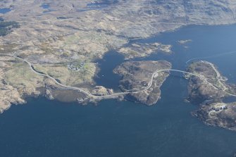 General oblique aerial view centred on Kylesku bridge and Garbh Eilean, looking NE.