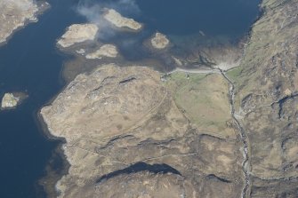 Oblique aerial view of a farmstead at Glencoul, looking NW.