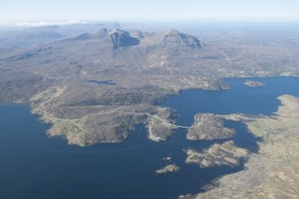 General oblique aerial view centred on Kylesku with Quinag beyond, looking SW.