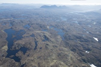 General oblique aerial view of Assynt centred on Loch an Tuir with Quinag beyond, looking E.